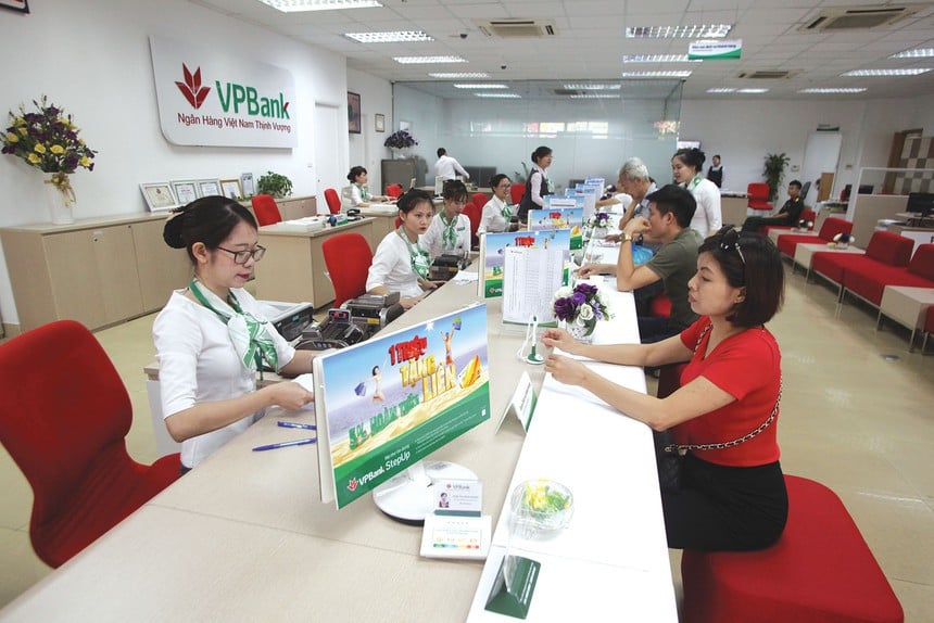 Ngấm “công nghệ”, ngân hàng cắt giảm nhân sự - Ảnh 1. Ngấm “công nghệ”, ngân hàng cắt giảm nhân sự - Ảnh 1.
