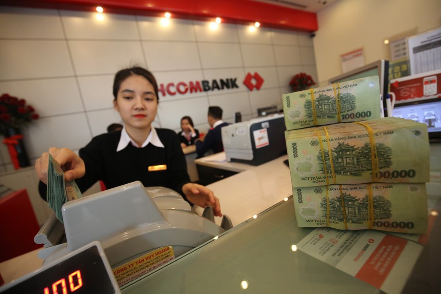 Tín dụng tăng trưởng thấp, vì sao ngân hàng vẫn báo lãi cao? - Ảnh 1. Tín dụng tăng trưởng thấp, vì sao ngân hàng vẫn báo lãi cao? - Ảnh 1.