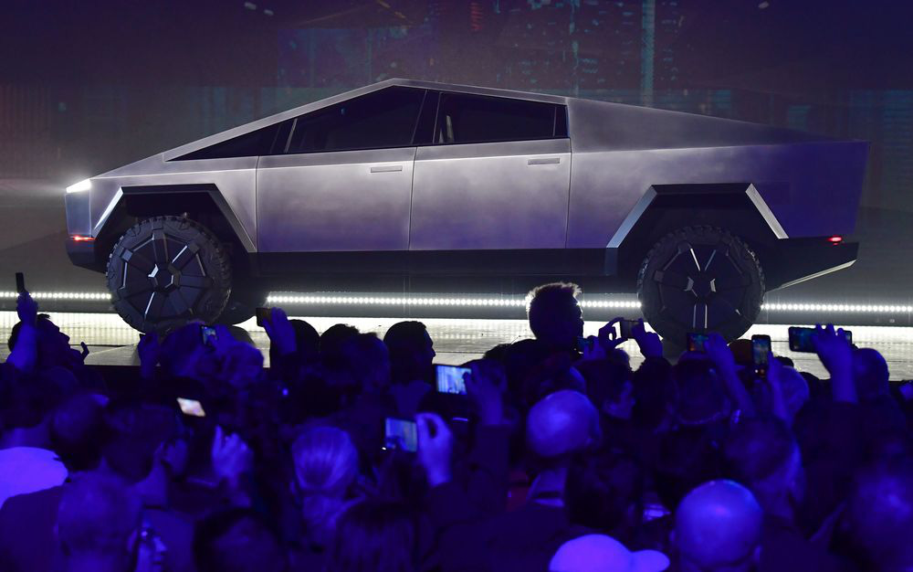 Xe bán tải chống đạn Tesla Cybertruck nhận gần 150.000 đơn đặt hàng trước - Ảnh 1. Xe bán tải chống đạn Tesla Cybertruck nhận gần 150.000 đơn đặt hàng trước - Ảnh 1.