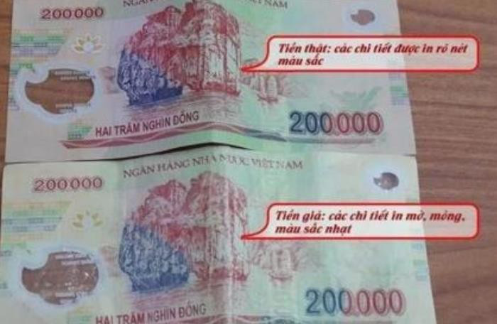 Ngân hàng Nhà nước khuyến cáo người tiêu dùng kiểm tra đồng tiền khi giao dịch tiền mặt - Ảnh 1. Ngân hàng Nhà nước khuyến cáo người tiêu dùng kiểm tra đồng tiền khi giao dịch tiền mặt - Ảnh 1.