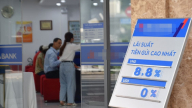 Ứng phó khi lãi suất, tỉ giá tăng