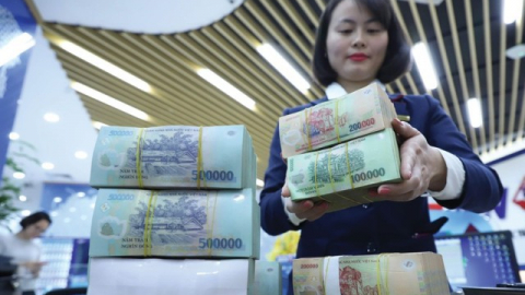 Yêu cầu các ngân hàng đảm bảo nhu cầu rút tiền mặt qua ATM của người dân