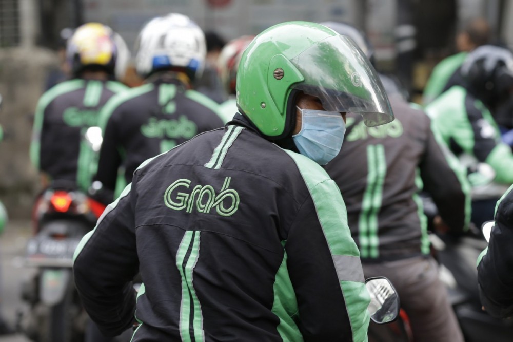 Grab bị điều tra độc quyền ở Malaysia - Ảnh 1.