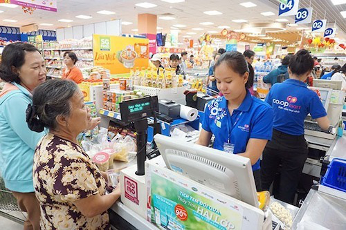 Cửa hàng tiện lợi, siêu thị mở cửa xuyên Tết - Ảnh 1. Cửa hàng tiện lợi, siêu thị mở cửa xuyên Tết - Ảnh 1.