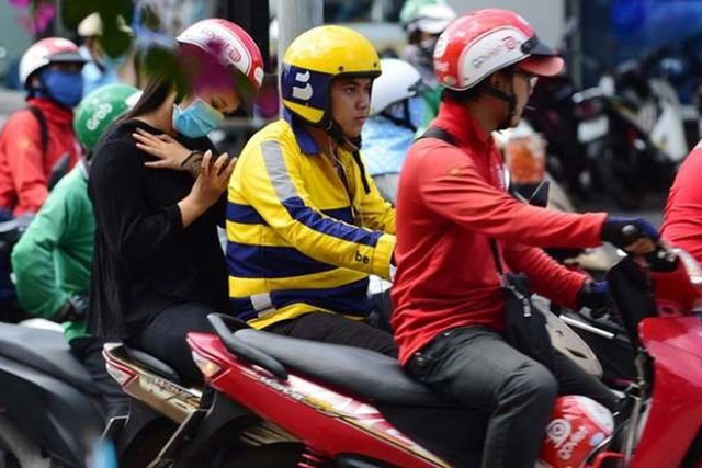 Xe ôm công nghệ đồng loạt tăng cước dịp Tết Nguyên đán - Ảnh 1. Xe ôm công nghệ đồng loạt tăng cước dịp Tết Nguyên đán - Ảnh 1.