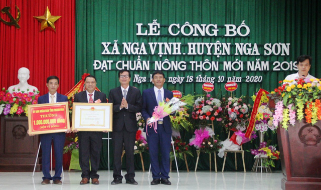 Thanh Hóa: Xã Nga Vịnh, huyện Nga Sơn đón nhận xã đạt chuẩn NTM - Ảnh 1.