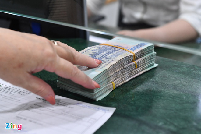 Có thể giảm hơn 10.000 tỷ đồng chi phí lãi vay - Ảnh 1. SSI cho rằng lãi suất tiền gửi sẽ không thay đổi nhiều sau quyết định của NHNN. Ảnh: Hoàng Hà.