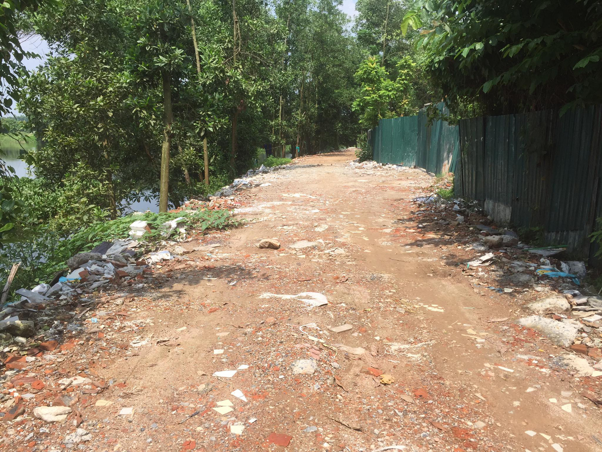 Hà Nội: Dân tự ý san lấp ruộng, xây nhà không phép trên đất công - Ảnh 4.