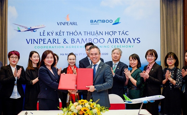 "Khai tử" Vinpearl Air, tỷ phú Phạm Nhật Vượng bắt tay với ông Trịnh Văn Quyết - Ảnh 1. "Khai tử" Vinpearl Air, tỷ phú Phạm Nhật Vượng bắt tay với ông Trịnh Văn Quyết - Ảnh 1.
