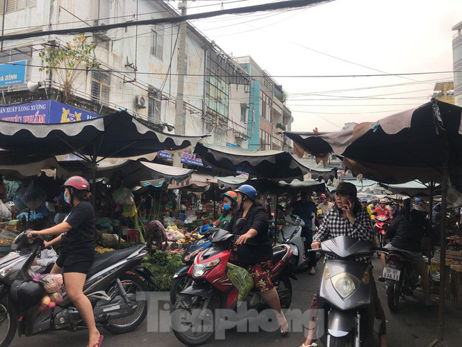 Trước "bão" corona, cá lóc nướng vẫn đắt hàng ngày Thần Tài - Ảnh 5. Trước "bão" corona, cá lóc nướng vẫn đắt hàng ngày Thần Tài - Ảnh 5.