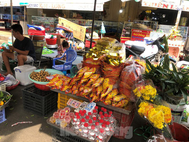 Trước "bão" corona, cá lóc nướng vẫn đắt hàng ngày Thần Tài - Ảnh 4. Trước "bão" corona, cá lóc nướng vẫn đắt hàng ngày Thần Tài - Ảnh 4.