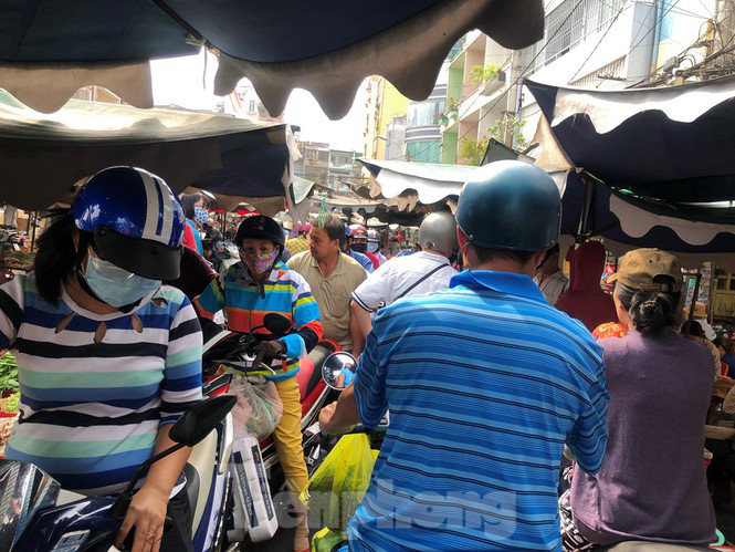 Trước "bão" corona, cá lóc nướng vẫn đắt hàng ngày Thần Tài - Ảnh 6. Trước "bão" corona, cá lóc nướng vẫn đắt hàng ngày Thần Tài - Ảnh 6.