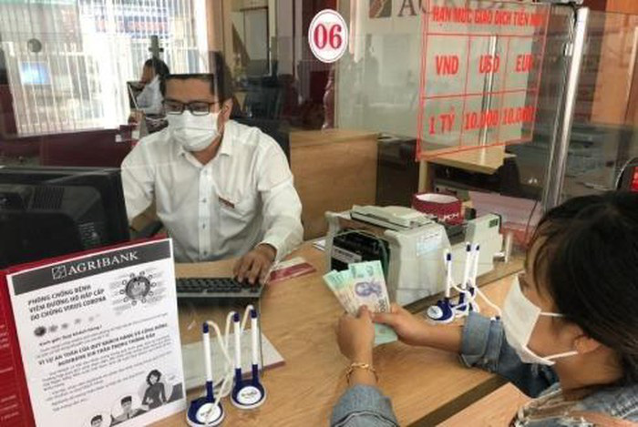 Lãi suất giảm, nhưng doanh nghiệp chưa dám mạnh tay vay vốn - Ảnh 1. Lãi suất giảm, nhưng doanh nghiệp chưa dám mạnh tay vay vốn - Ảnh 1.