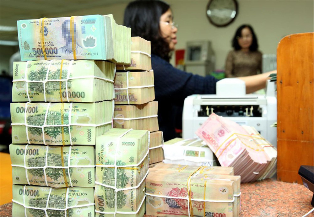 Doanh nghiệp 'khát' vốn, tiền lại ứ đọng ở ngân hàng - Ảnh 1. Doanh nghiệp 'khát' vốn, tiền lại ứ đọng ở ngân hàng - Ảnh 1.