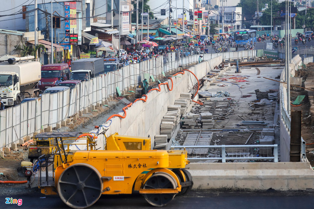 Bất động sản khu Tây Bắc TP.HCM tắc nghẽn vì giao thông - Ảnh 14.