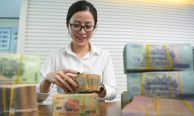Vì sao ngân hàng lãi lớn dù doanh nghiệp 'ngấm đòn' Covid-19 - - Ảnh 1. Vì sao ngân hàng lãi lớn dù doanh nghiệp 'ngấm đòn' Covid-19 - - Ảnh 1.