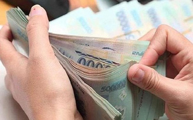 Chậm trả lương, trả lương không đủ doanh nghiệp có thể bị phạt tới 100 triệu đồng - Ảnh 1.