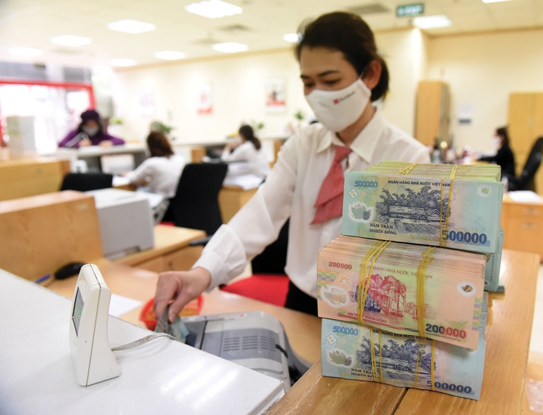 Giảm kịch sàn lãi vay để cứu doanh nghiệp - Ảnh 1. Giảm kịch sàn lãi vay để cứu doanh nghiệp - Ảnh 1.