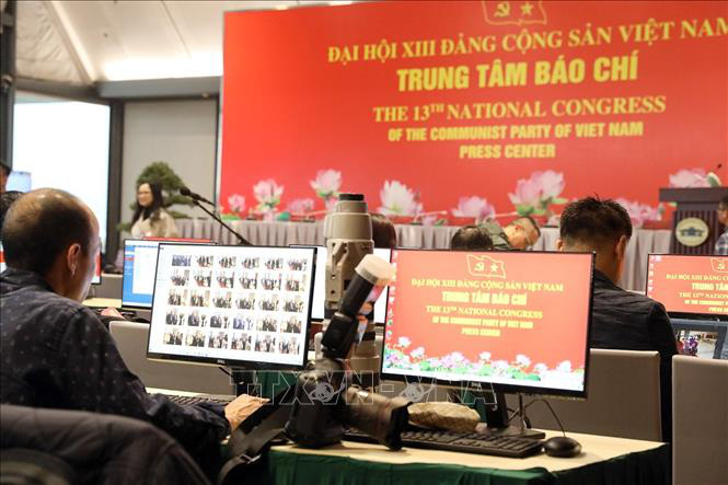 Gần 500 phóng viên, biên tập viên các cơ quan báo chí trực tiếp đưa tin Đại hội XIII của Đảng - Ảnh 1.