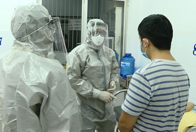Sát Tết Tân Sửu phát hiện 2 ca Covid-19, nâng mức phòng chống dịch - Ảnh 1.