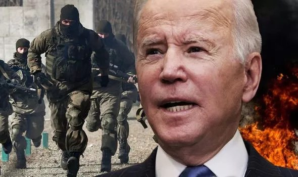 Putin dồn quân đến biên giới Ukraine, Biden có thể buộc phải ra tay - Ảnh 1.