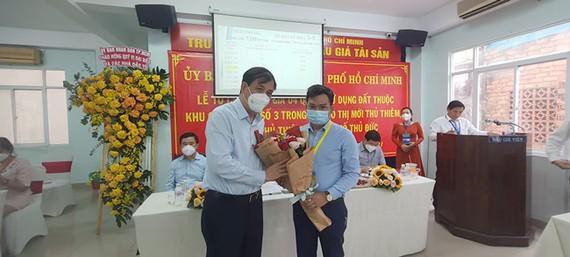 Kịch tính cuộc đấu giá lô 'đất vàng' hơn 1 tỷ đồng/m2 ở Thủ Thiêm - Ảnh 3.