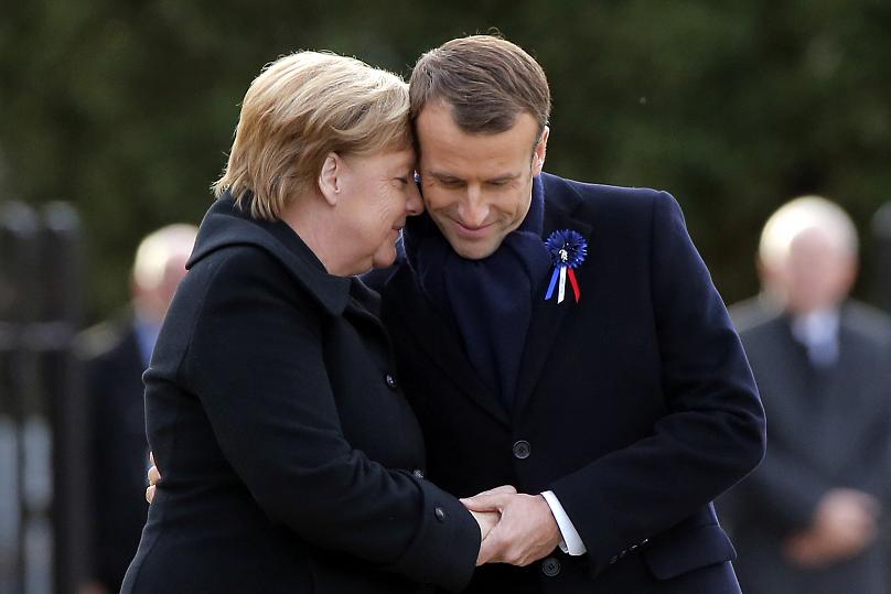 Những hình ảnh đẹp nhất của bà Merkel trong 16 năm cầm quyền - Ảnh 11.