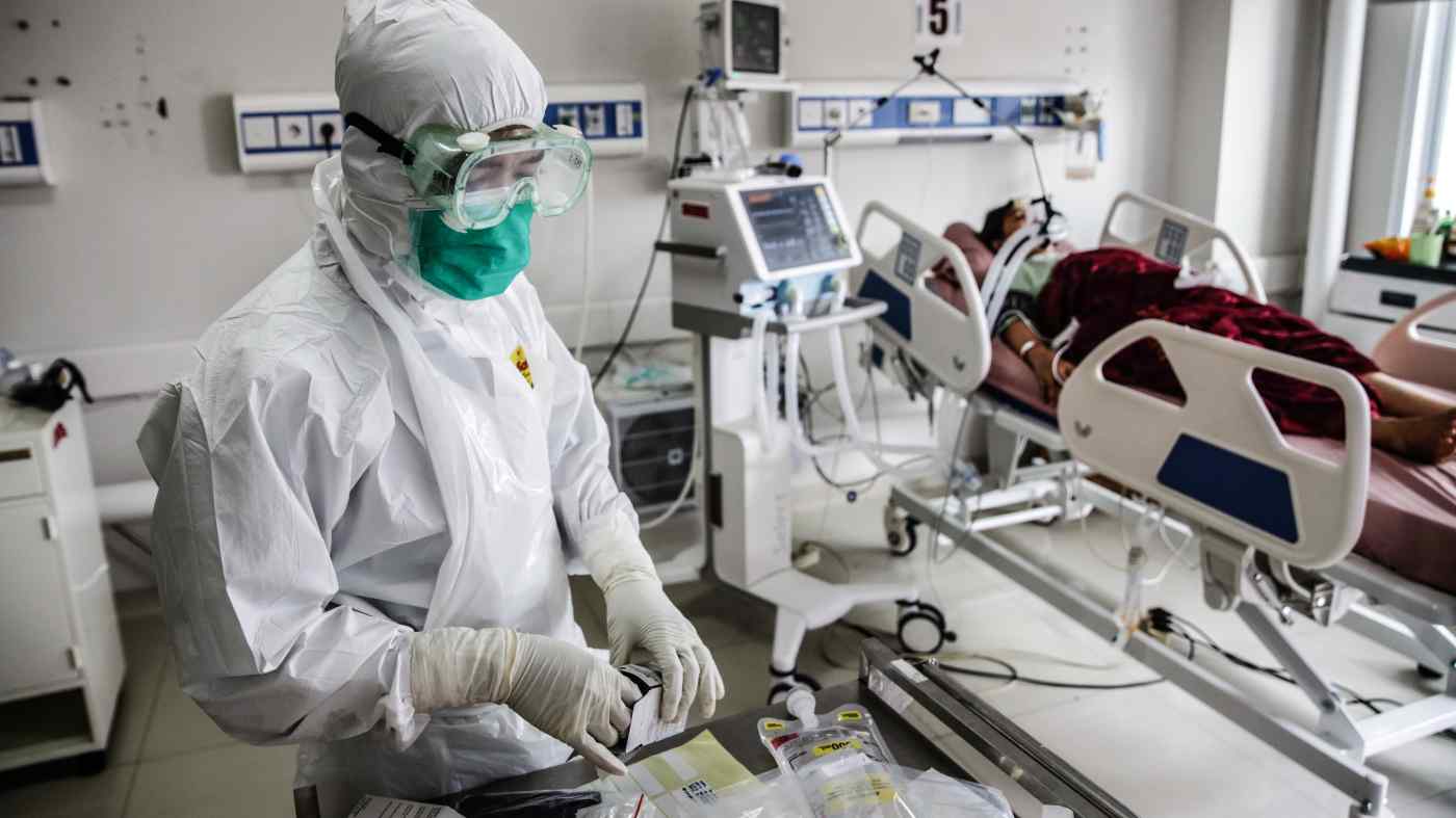 Vượt qua Ấn Độ, Indonesia thành ổ dịch Covid-19 nguy hiểm nhất châu Á lúc này - Ảnh 1. Vượt qua Ấn Độ, Indonesia thành ổ dịch Covid-19 nguy hiểm nhất châu Á lúc này - Ảnh 1.