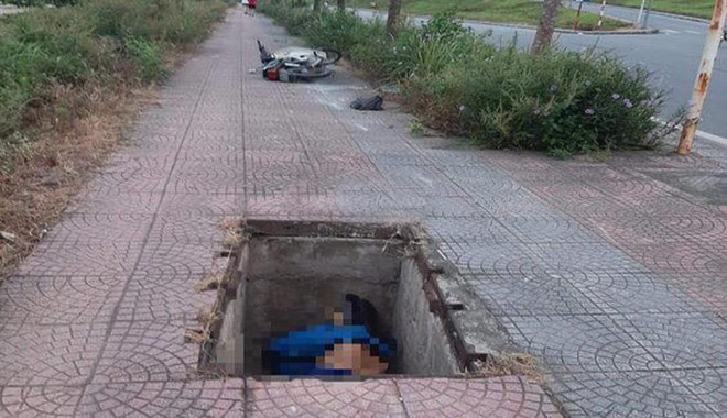 Điều tra vụ thi thể nam giới nằm dưới hố cáp ngầm - Ảnh 1.