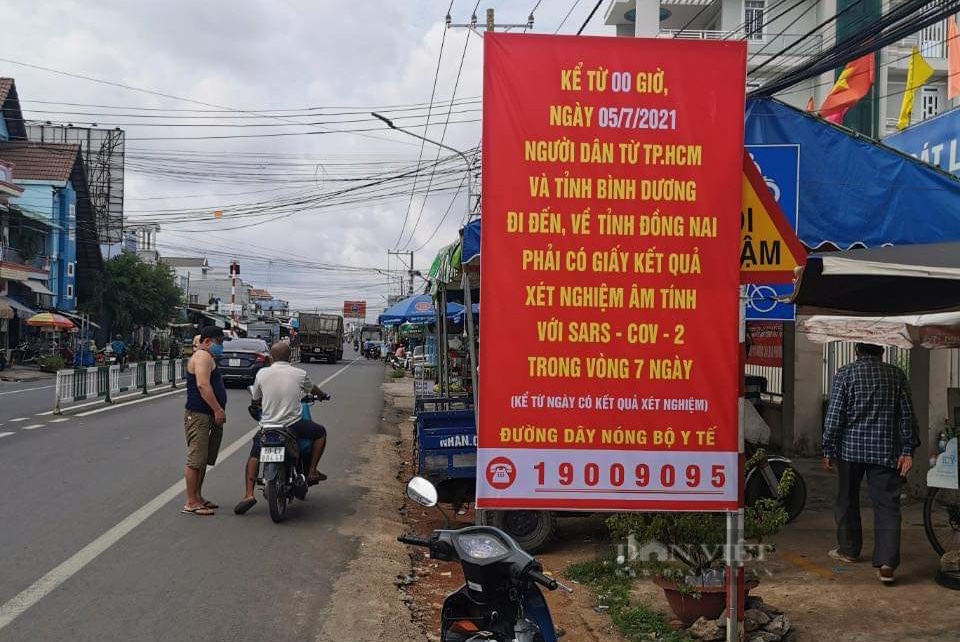 Đồng Nai: Ghi nhận 10 ca dương tính với SARS-CoV-2, phong toả thêm 1 xã và nhiều khu vực - Ảnh 4.