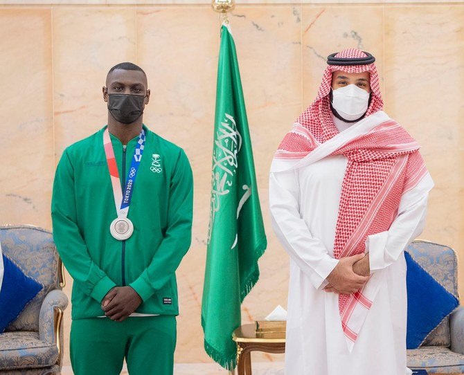Võ sĩ đánh ngất xỉu đối thủ tại Olympic 2020 được tôn vinh như người hùng - Ảnh 3.