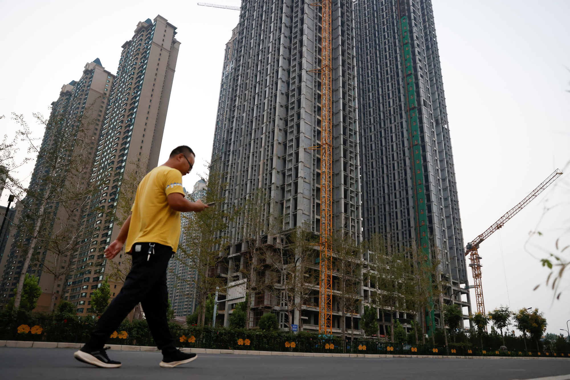 Khủng hoảng nợ ở China Evergrande và hệ lụy với phần còn lại của thế giới - Ảnh 1. Khủng hoảng nợ ở China Evergrande và hệ lụy với phần còn lại của thế giới - Ảnh 1.