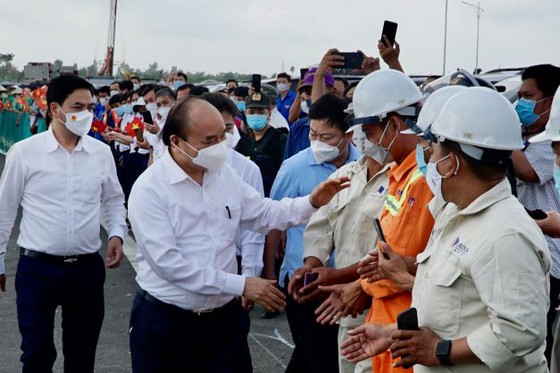 Chủ tịch nước Nguyễn Xuân Phúc dự lễ thông xe kỹ thuật cao tốc Trung Lương - Mỹ Thuận - Ảnh 11.
