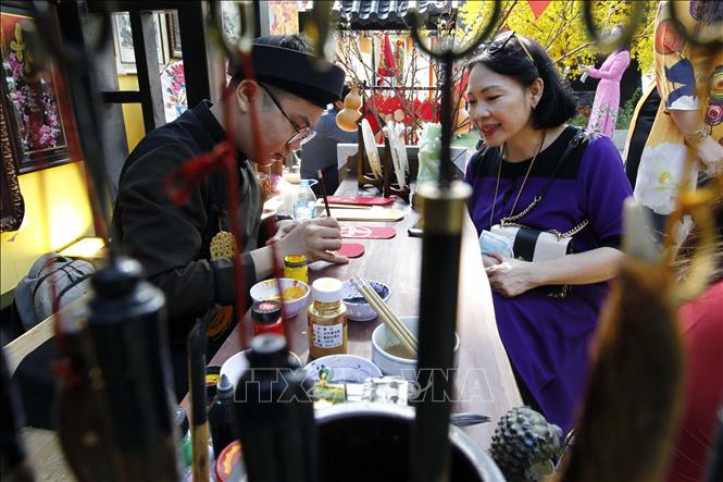 TP Hồ Chí Minh rộn ràng đón Xuân - Ảnh 5.