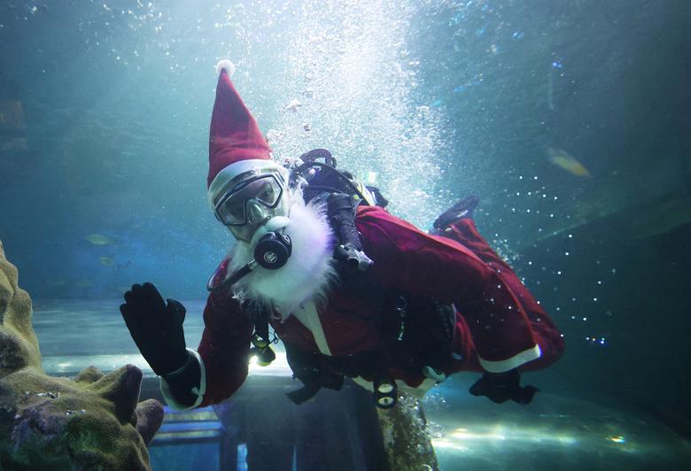Những hình ảnh thú vị của các ông già Noel trên thế giới - Ảnh 4.