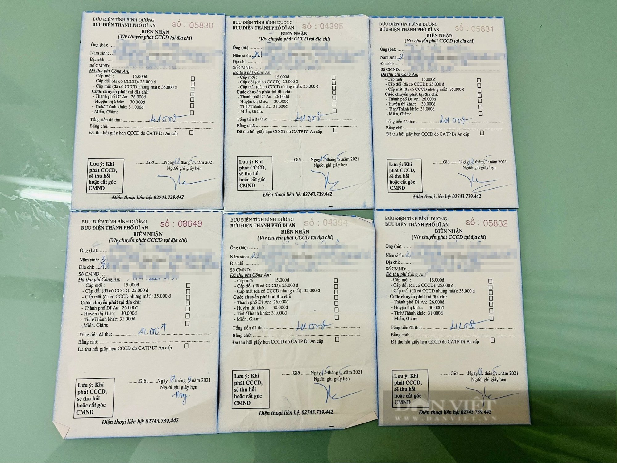 Giám đốc Bưu điện tỉnh Bình Dương nói gì về việc người dân đăng ký chuyển phát thẻ CCCD nhưng phải tự đi lấy? - Ảnh 1.