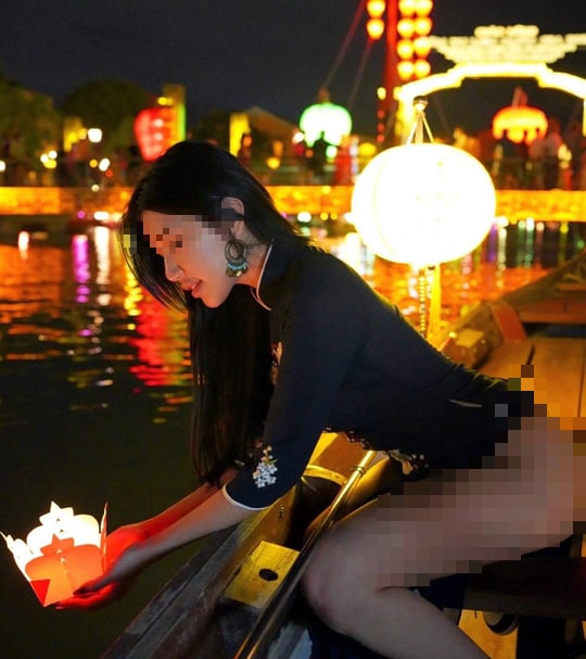 Xôn xao hình ảnh nữ du khách trẻ mặc áo dài khoe mông ở Hội An - Ảnh 2.