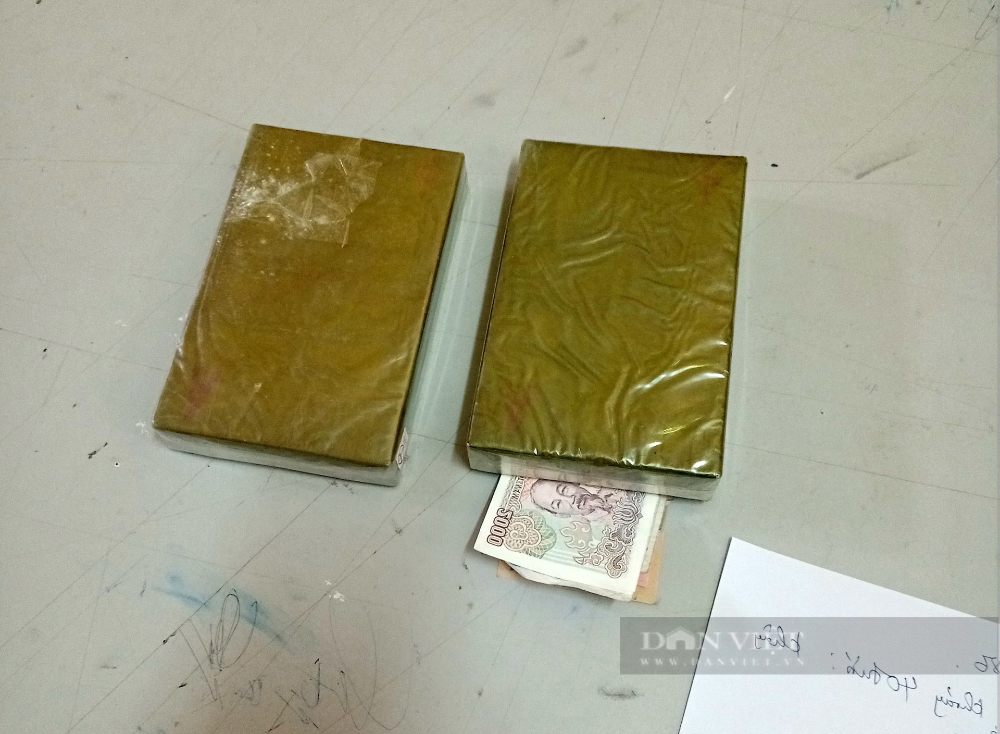 Sơn La: Bắt đối tượng vận chuyển trái phép hai bánh heroin - Ảnh 2. Sơn La: Bắt đối tượng vận chuyển trái phép hai bánh heroin - Ảnh 2.