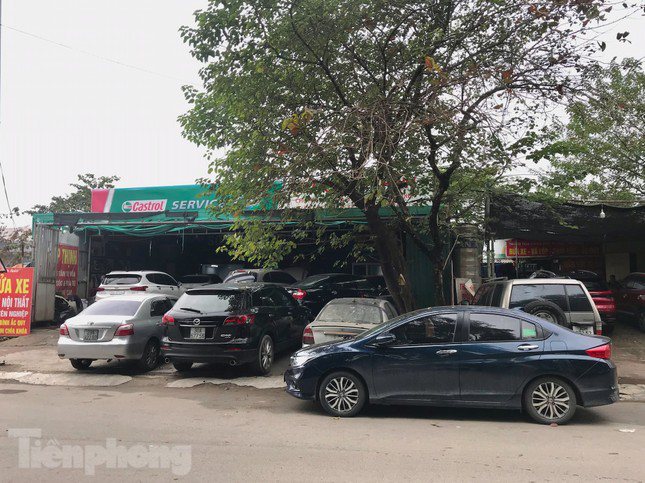 Người dùng tấp nập đưa ô tô đi bảo dưỡng dịp cận Tết - Ảnh 2.