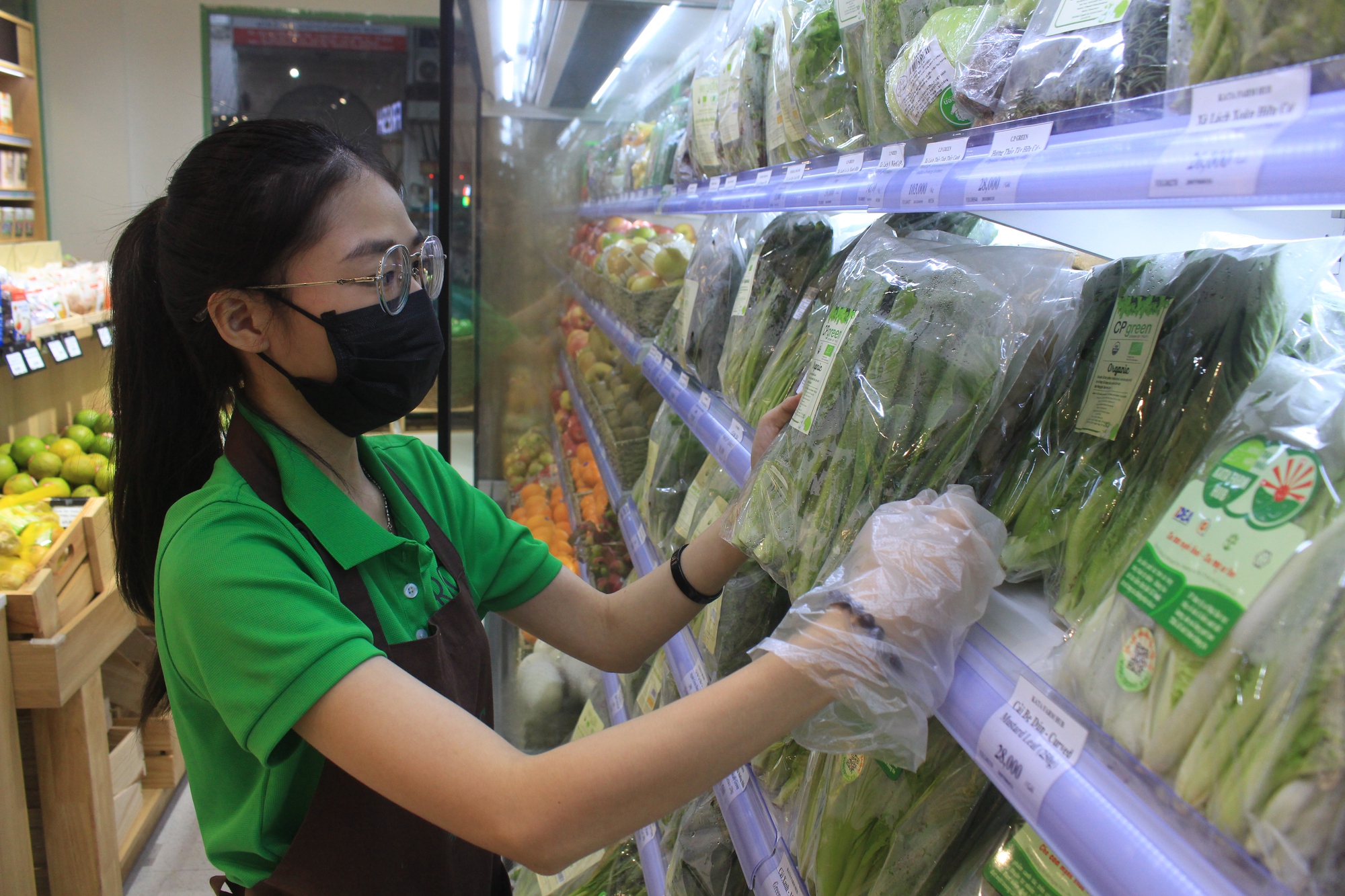 Khai trương đầu năm, siêu thị, cửa hàng lì xì đậm cho khách - Ảnh 2.