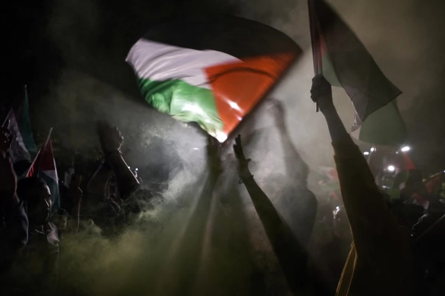 Cảnh tàn phá và đau thương khi hơn 1.100 người thiệt mạng trong xung đột Israel-Hamas - Ảnh 16.