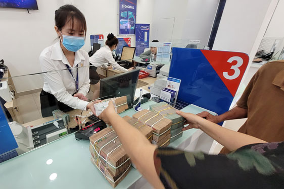 Bắt đầu làn sóng hạ lãi suất cho vay - Ảnh 1.