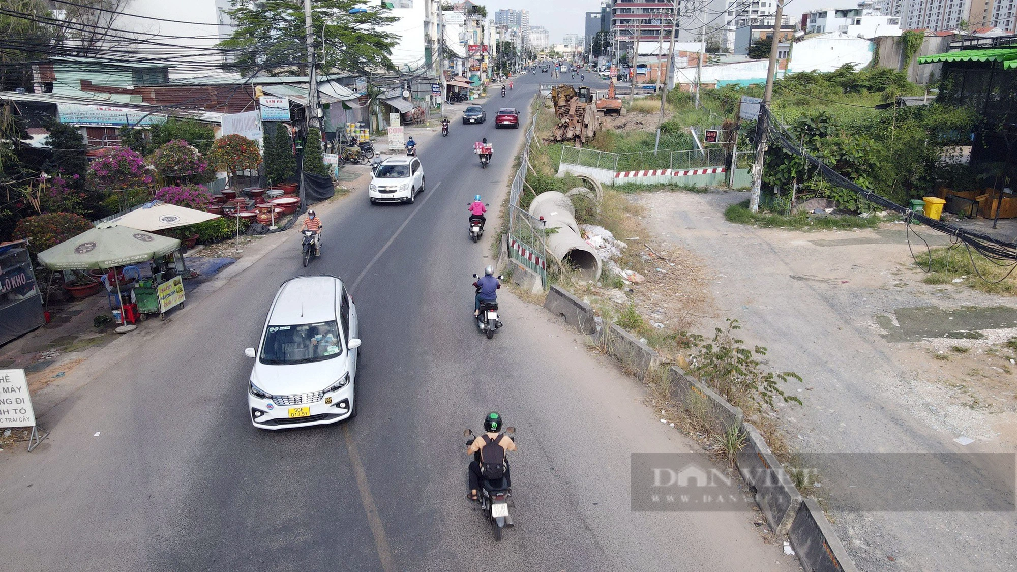 Hơn 8 năm chưa mở rộng xong 2,5km đường Lương Định Của, dự án tiếp tục “chôn chân” chờ mặt bằng - Ảnh 2.