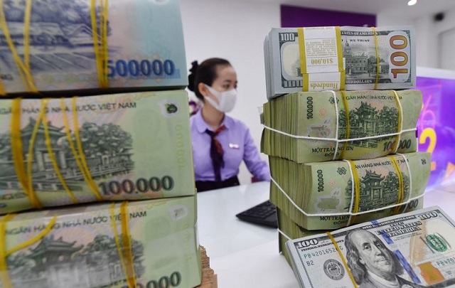 Ngân hàng Nhà nước giảm mạnh lãi suất điều hành từ ngày mai, 15/3 - Ảnh 1.
