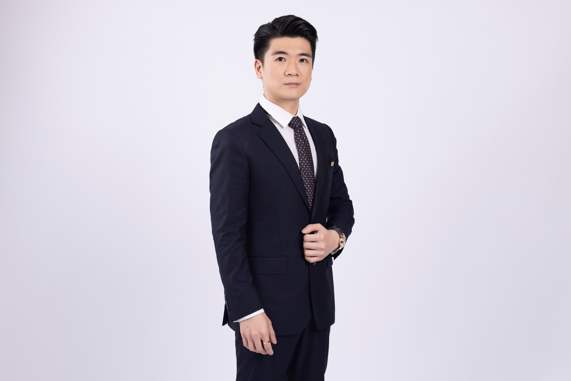 Chân dung 2 tân Phó Chủ tịch SHB Đỗ Quang Vinh và Đỗ Đức Hải  - Ảnh 1.