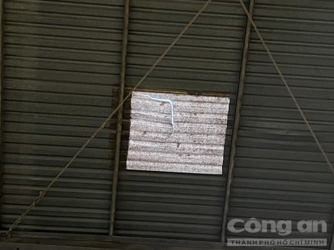 Điều tra vụ nghi vấn nam thanh niên rơi xuyên mái nhà tử vong sau khi bị chồng bạn gái rượt đuổi - Ảnh 1.