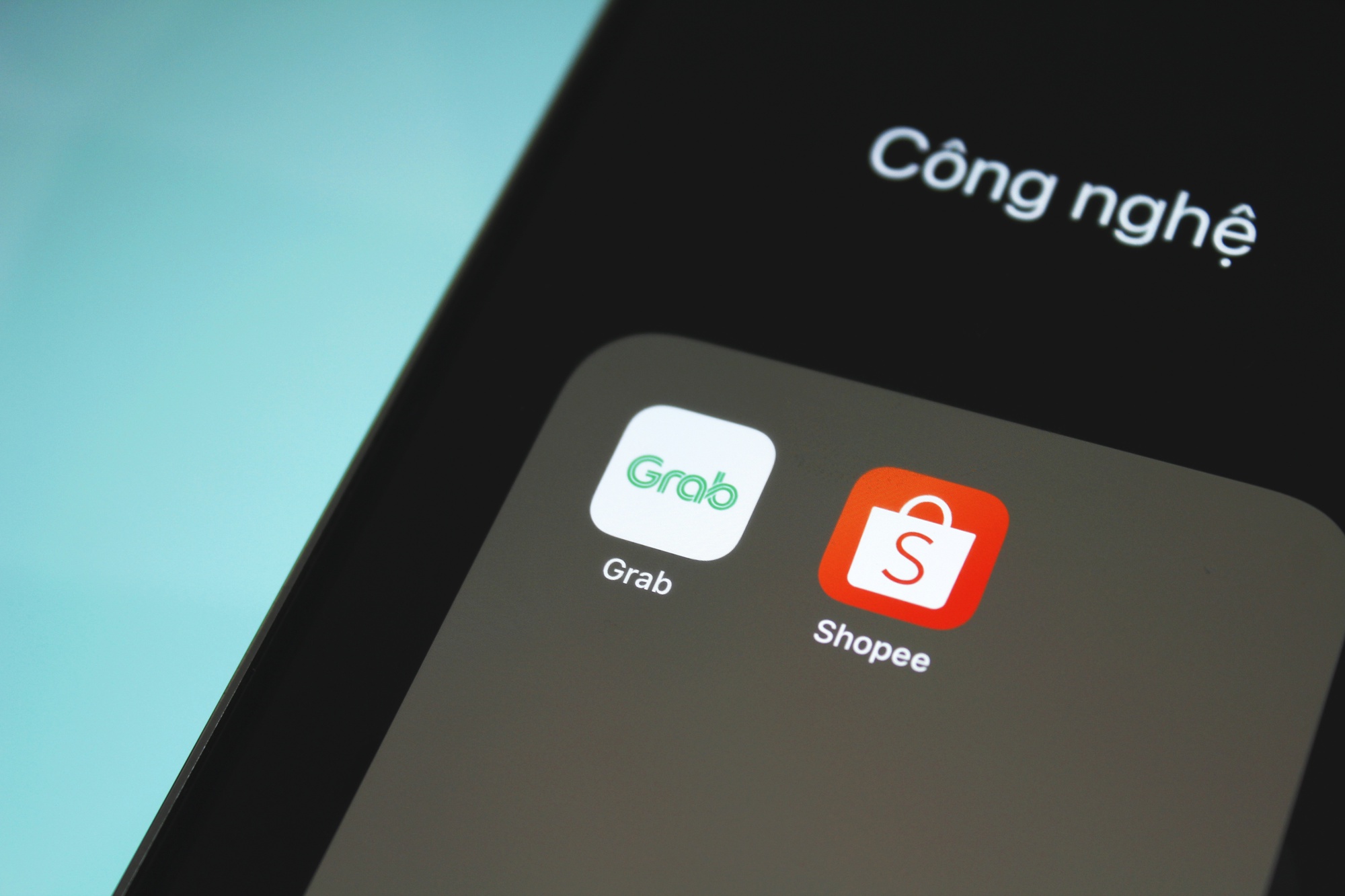 Cách Grab và Shopee tìm đường thoát lỗ - Ảnh 1.