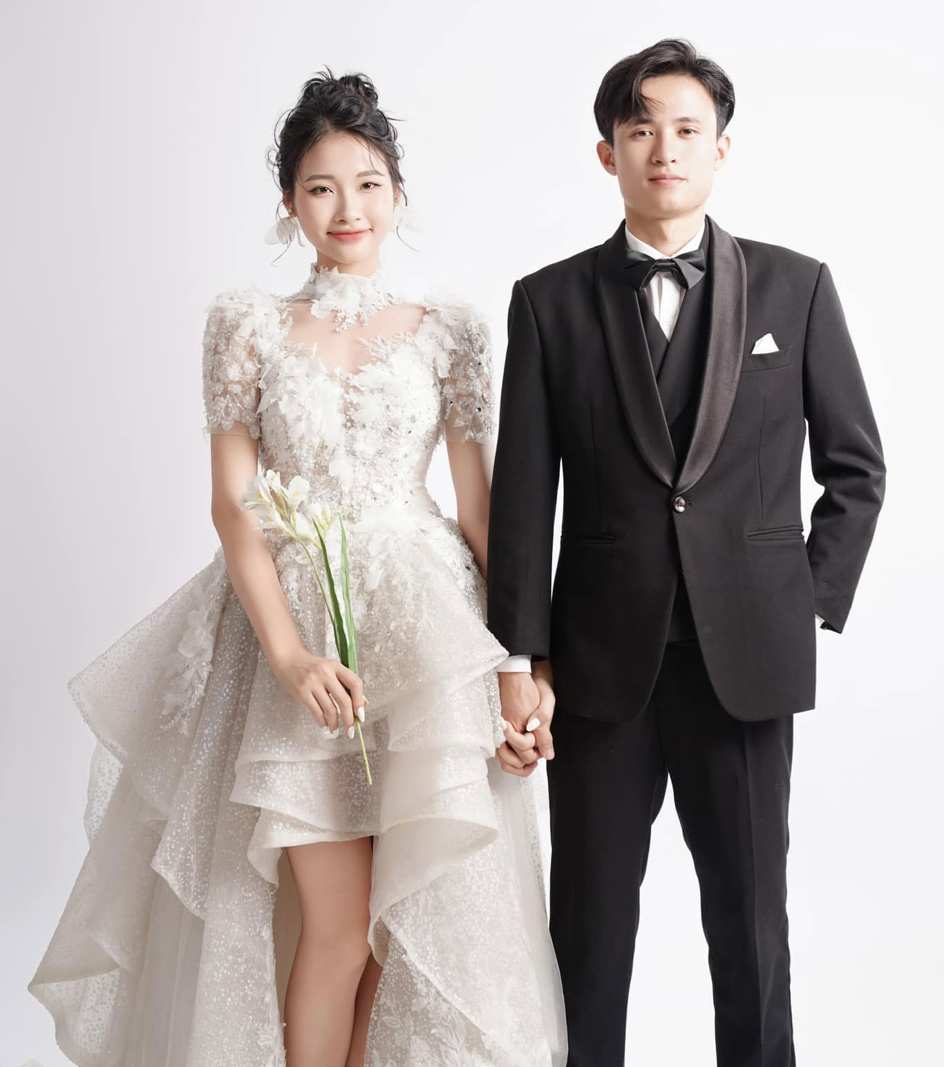 Cặp VĐV chồng chạy, vợ võ tổ chức đám cưới - Ảnh 1.