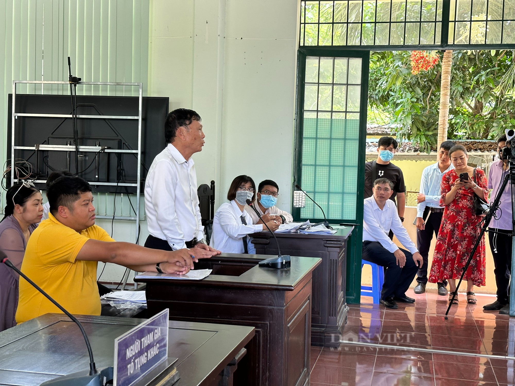 Tiếp tục tạm ngưng phiên tòa vụ công ty của ông David Dương kiện người phụ nữ &quot;nói xấu&quot; bãi rác Đa Phước - Ảnh 1.