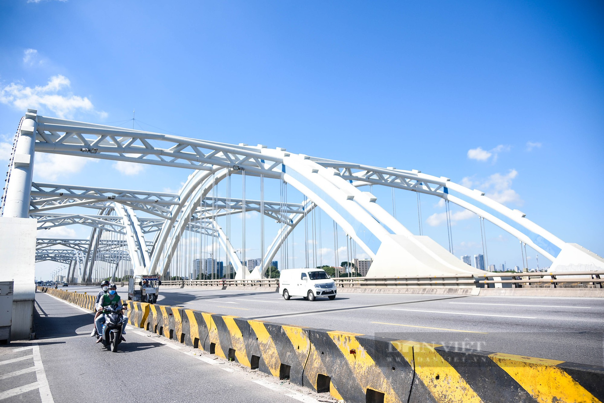 Chiêm ngưỡng cây cầu vòm thép vượt sông rộng nhất Việt Nam sau gần 10 năm đưa vào sử dụng - Ảnh 9.